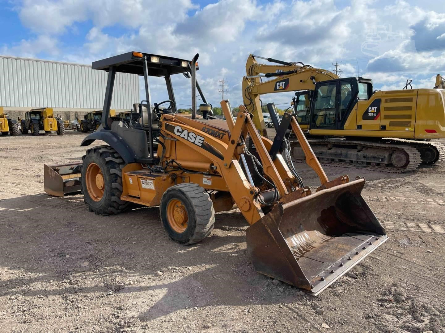 Case 570M XT Loader Backhoe