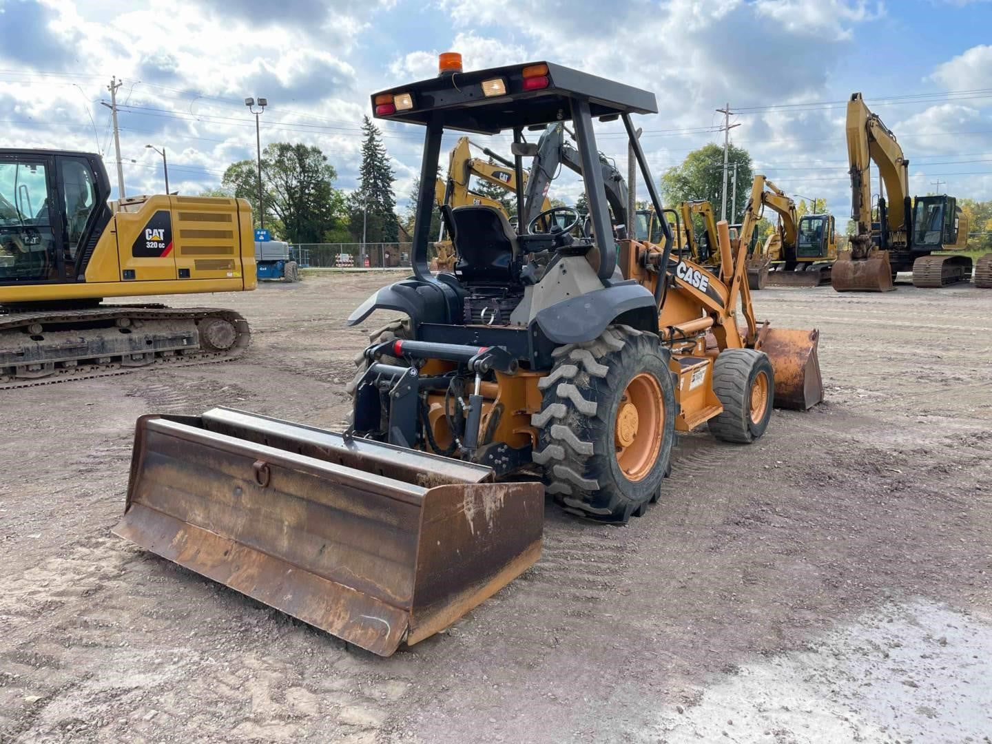 Case 570M XT Loader Backhoe