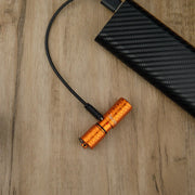 OLIGHT I1R2PROPWOG i1R 2 Pro Keychain Flashlight - Pinwheel Orange